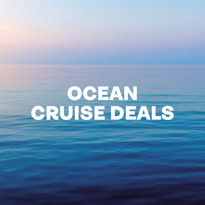 Ocean Cruise Deals overlaid on a image of a blue ocean at sunset